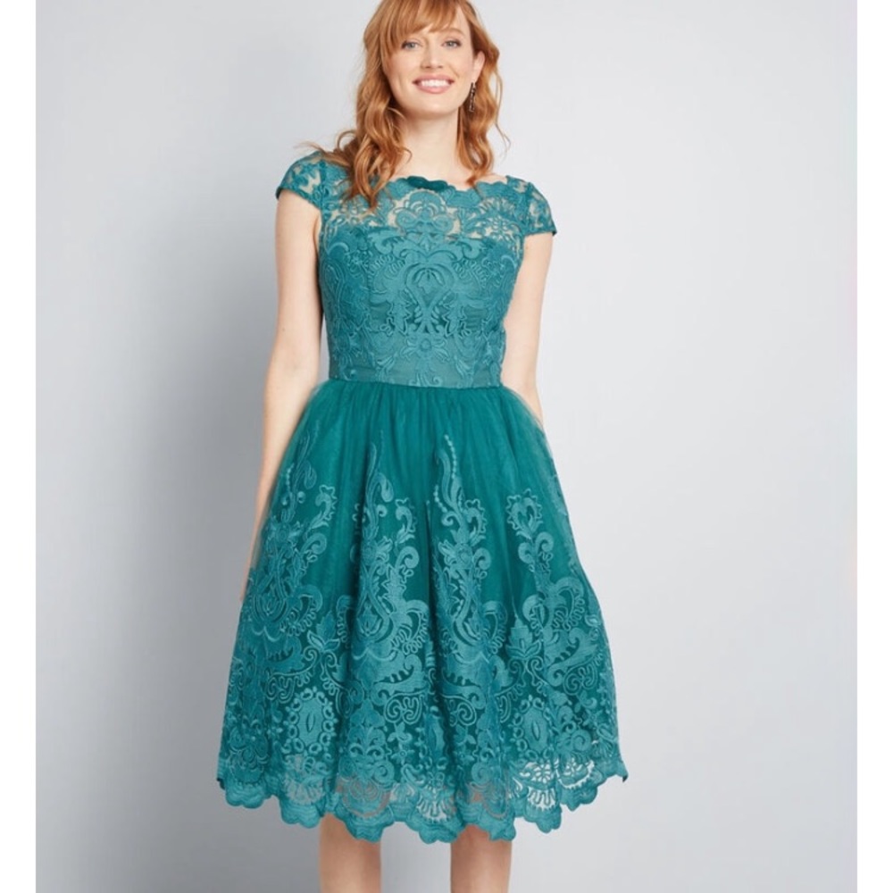 Exquisite Elegant Lace Dress in teal.